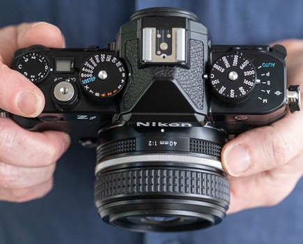 Nikon Zf in-hand with 40mm f/2 lens
